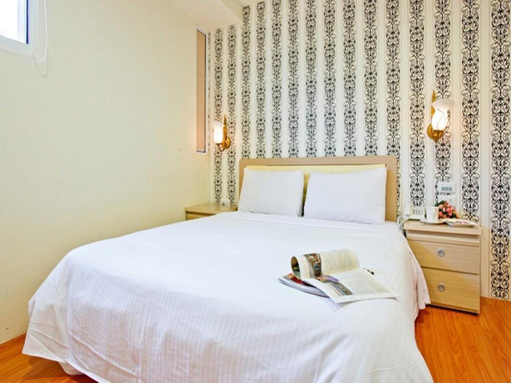 Green Park Commercial Hotel Тайнань Номер фото