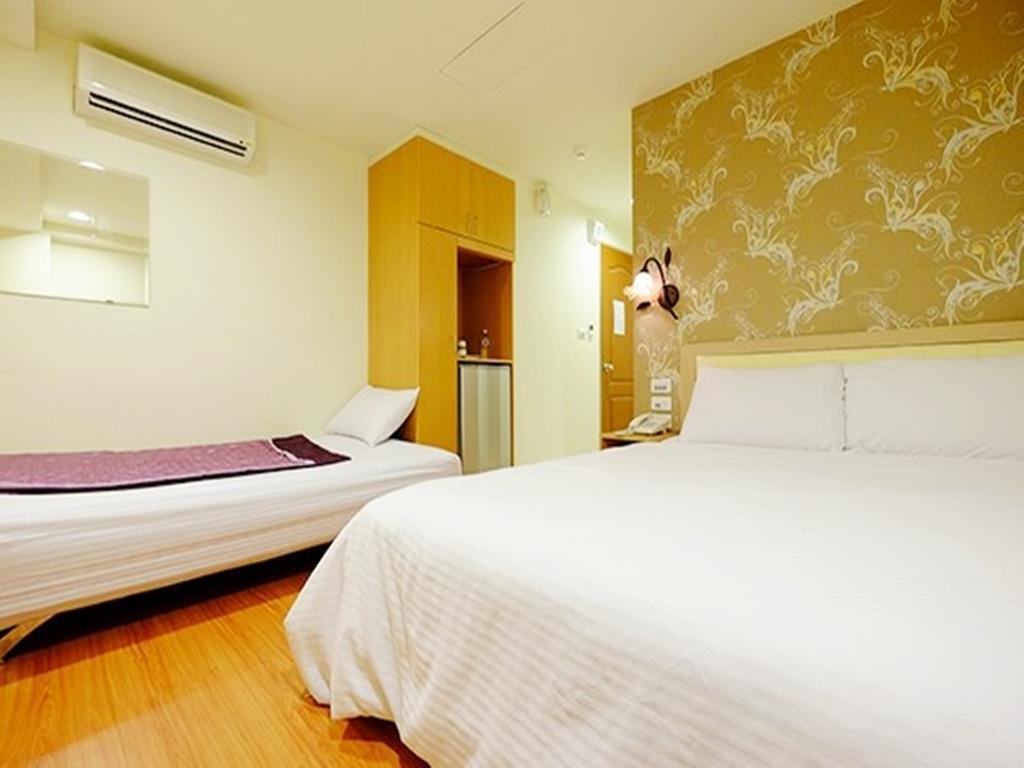 Green Park Commercial Hotel Тайнань Номер фото